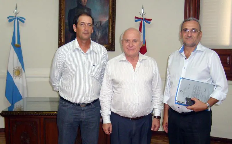 Perotti y Calvo junto al gobernador