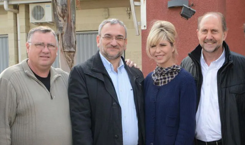 Mario Bertello junto a Dirigentes